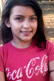 girl with Coca Cola shirt Axayachtl farm